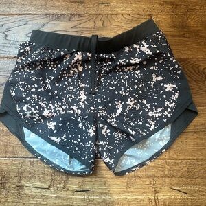 Under Armour Grey and pink XS running shorts with liner